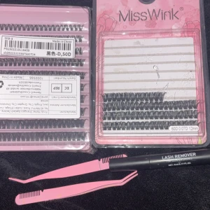 Fransar  - Säljer ett kit med svarta lösögonfransar från MissWink i olika längder och tjocklekar, perfekt för att skapa volymfransar. Medföljer två rosa pincetter och en Lash Remover-penna för enkel applicering och borttagning. Allt du behöver för snygga fransar hemma!