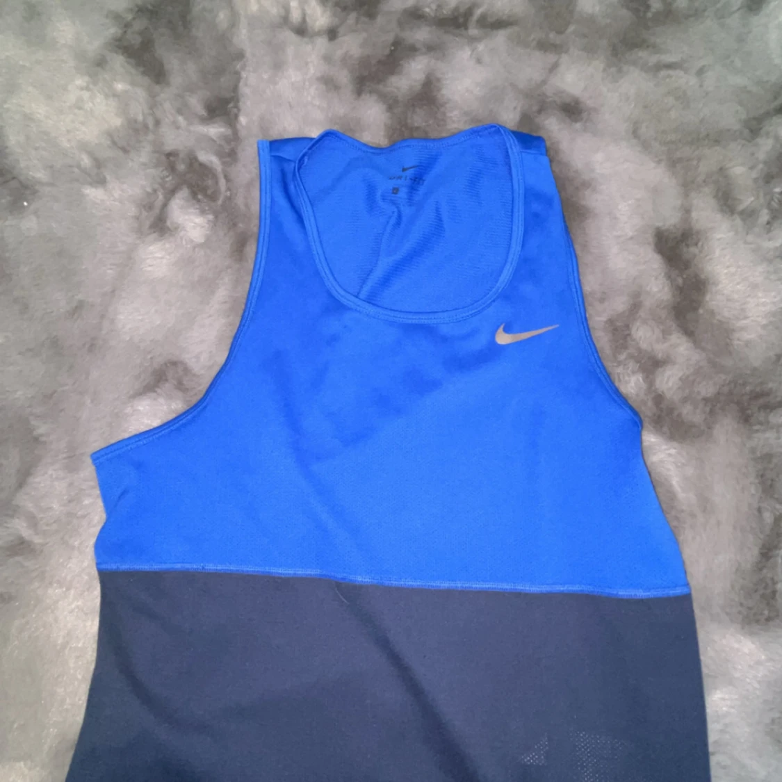 Blå och mörkblå linnetopp från Nike