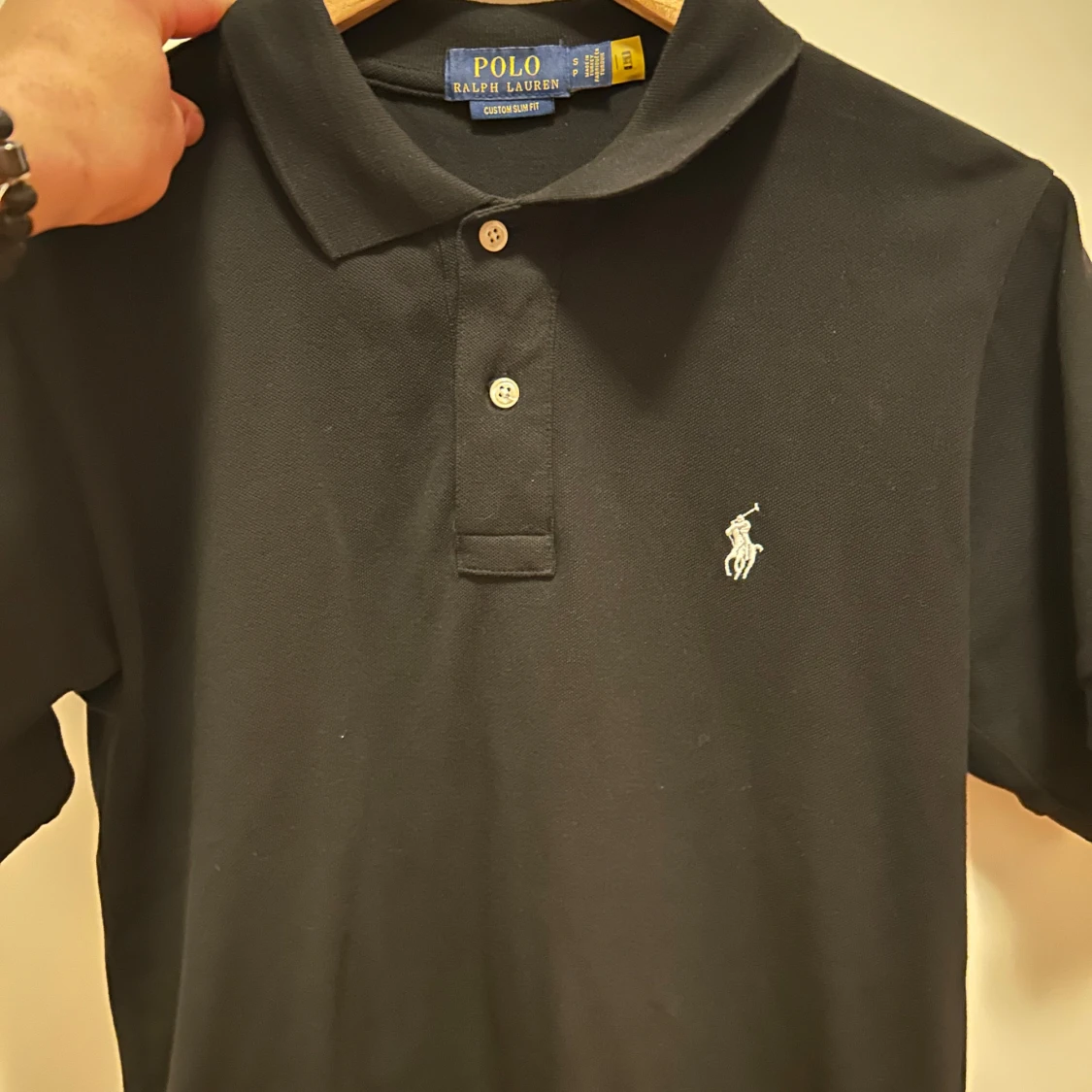 Svart pikétröja från Ralph Lauren