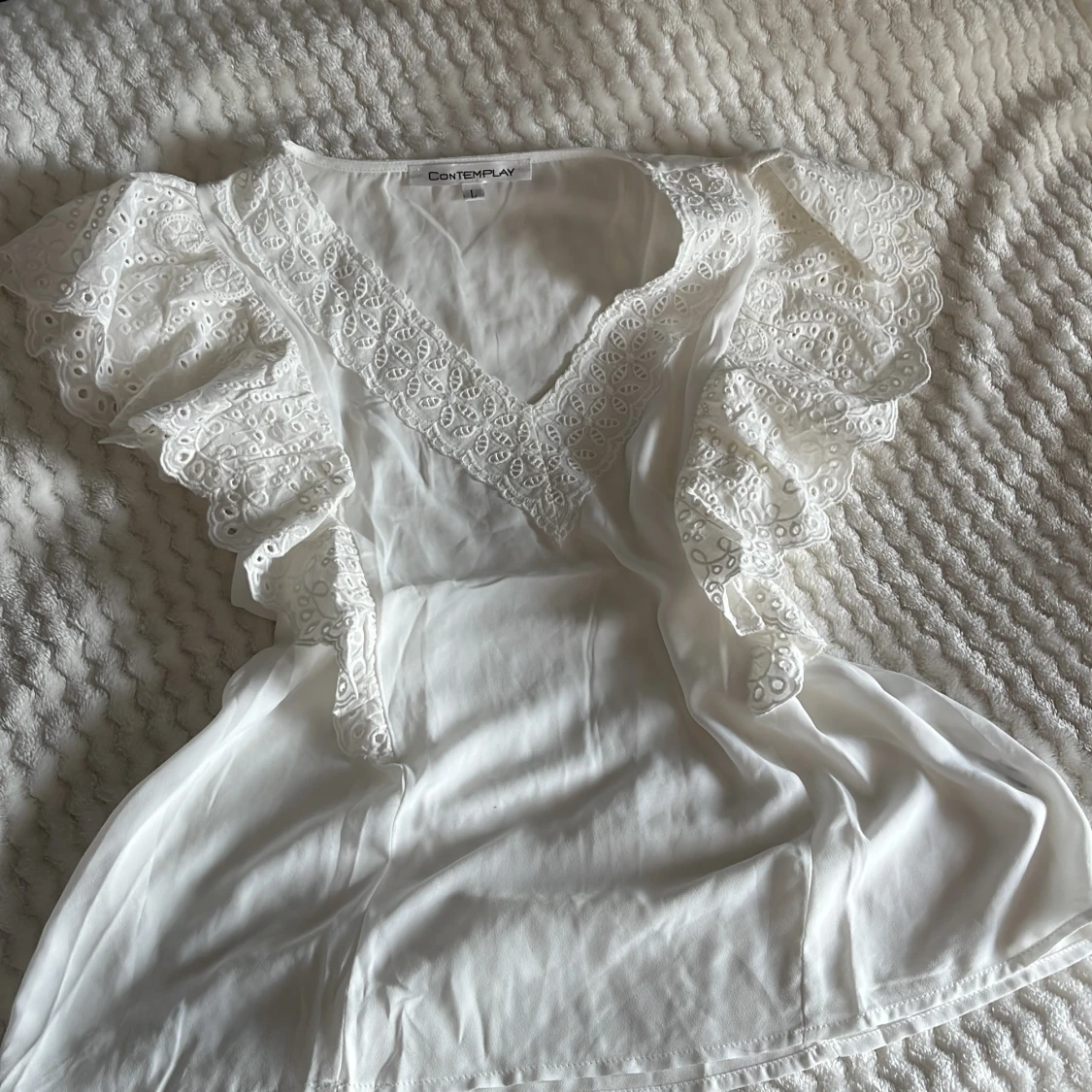 Vit blus från Contemplay