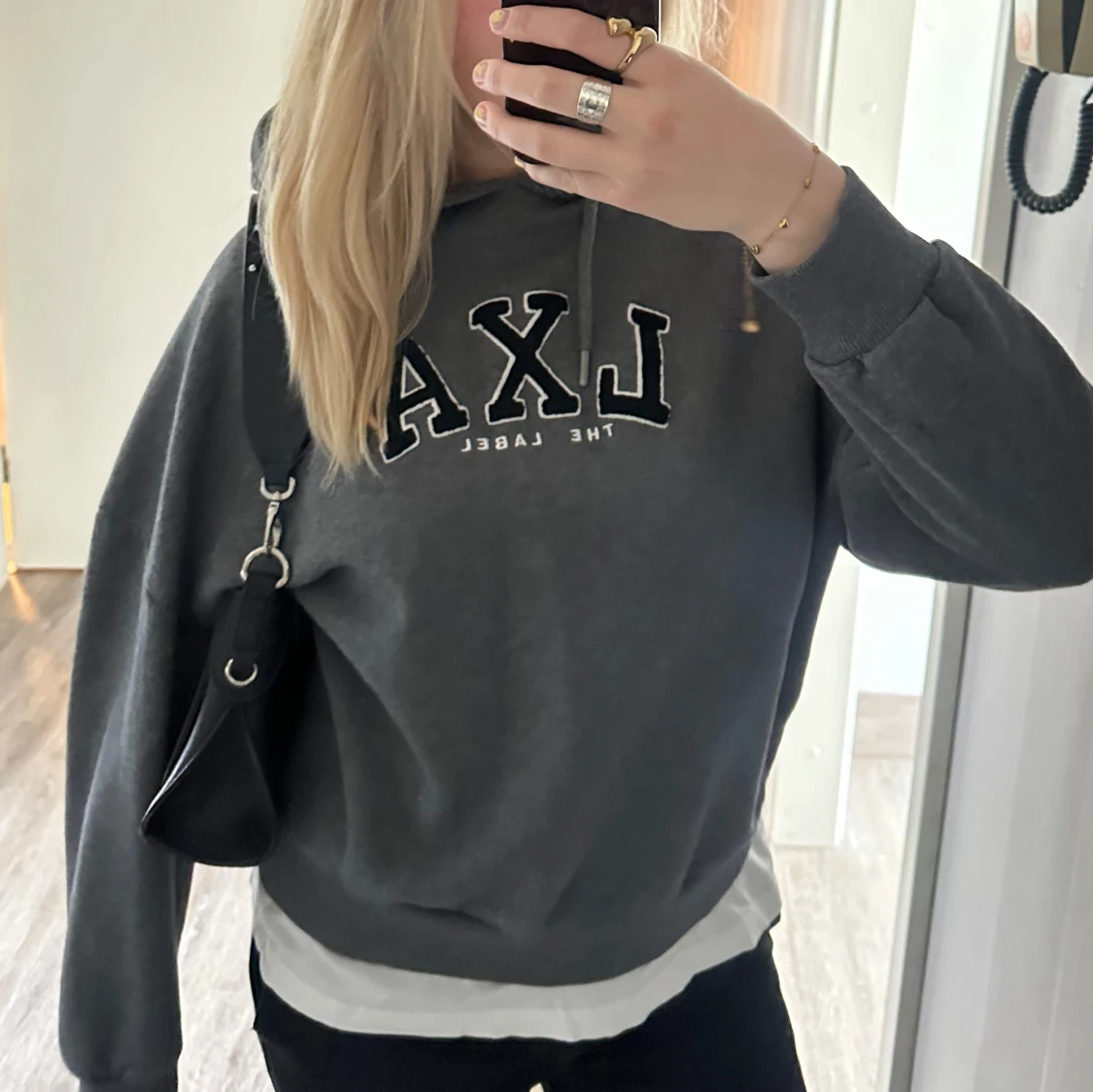 Mörkgrå hoodie från LXA The Label - 1