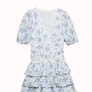 Blommig kortklänning med volanger - Supersöt volangklänning. Ny med lapp. Märkt som M men passar S. 