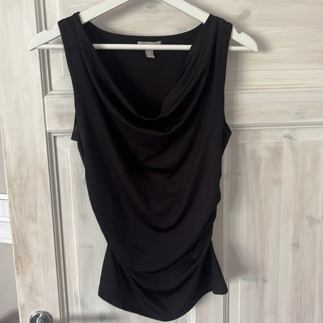 Svart draperad linnetopp från H&M