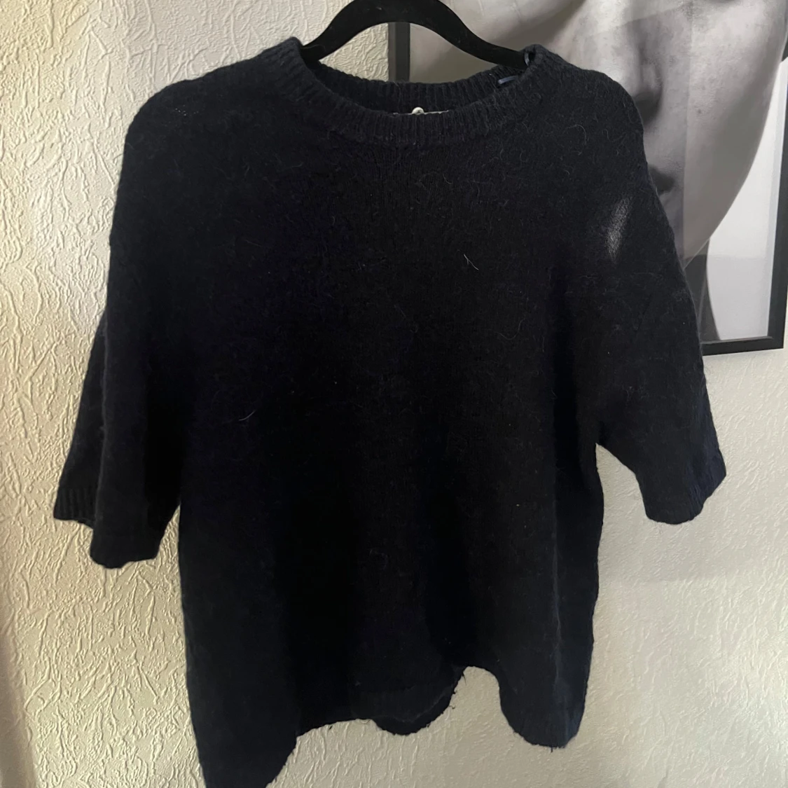 Marinblå stickad tröja med kort ärm