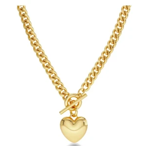 Barley Necklace Maxi Gold hjärthalsband - Chunky halsband i guldtonad metall med en bred kedja och ett stort hjärthänge. Låset är en snygg toggle-variant som ger extra edge. Perfekt statement piece för dig som gillar att sticka ut med accessoarer. Ny pris 800kr. Knappt använd!