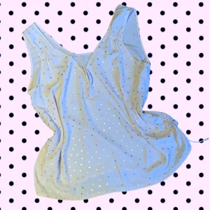 Prickig linnetopp - Supersöt ljusrosa linnetopp med små guldiga prickar. Superlätt och bekväm!