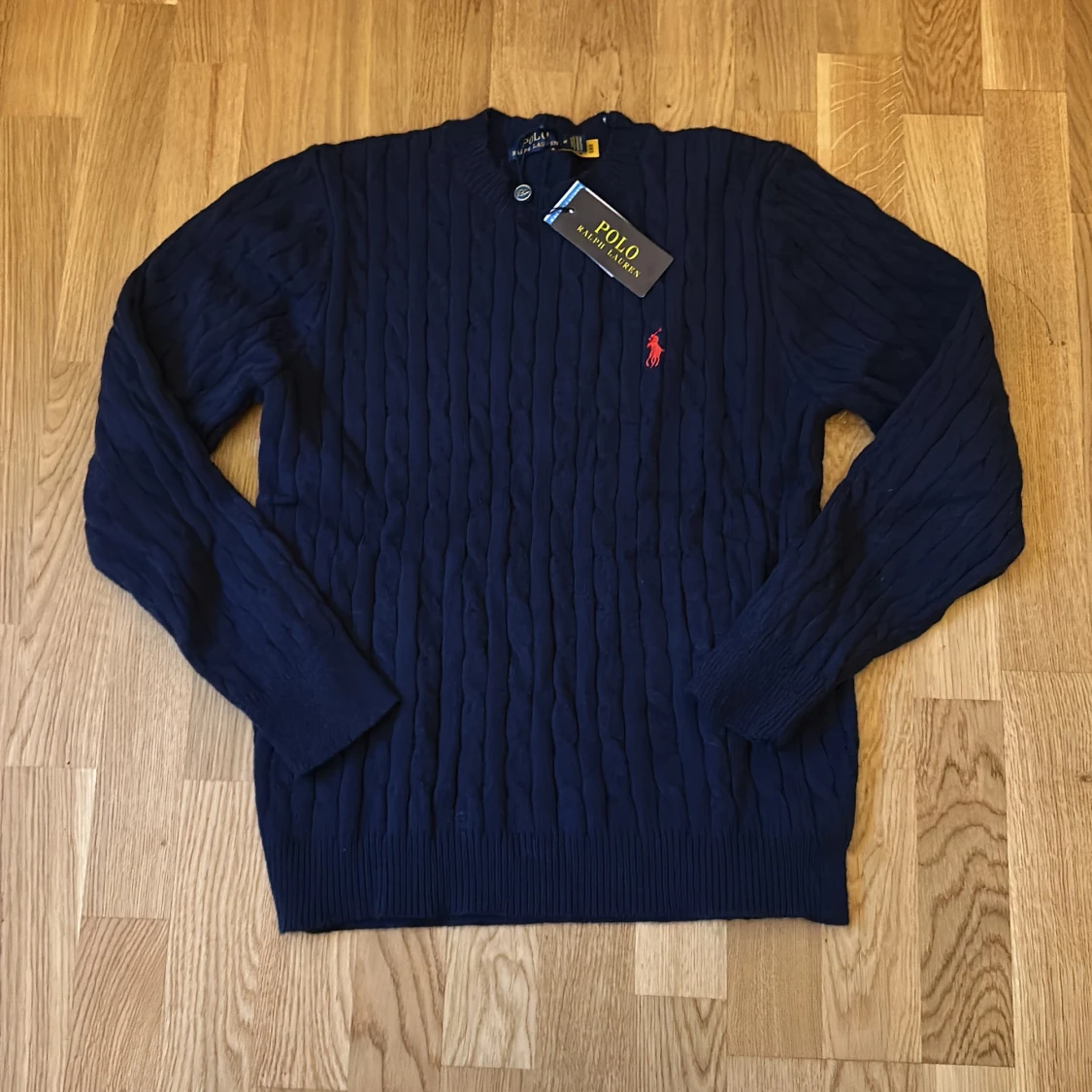 Mörkblå stickad tröja Polo Ralph Lauren
