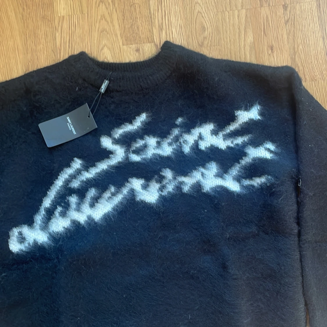 Svart stickad tröja från Saint Laurent - 1