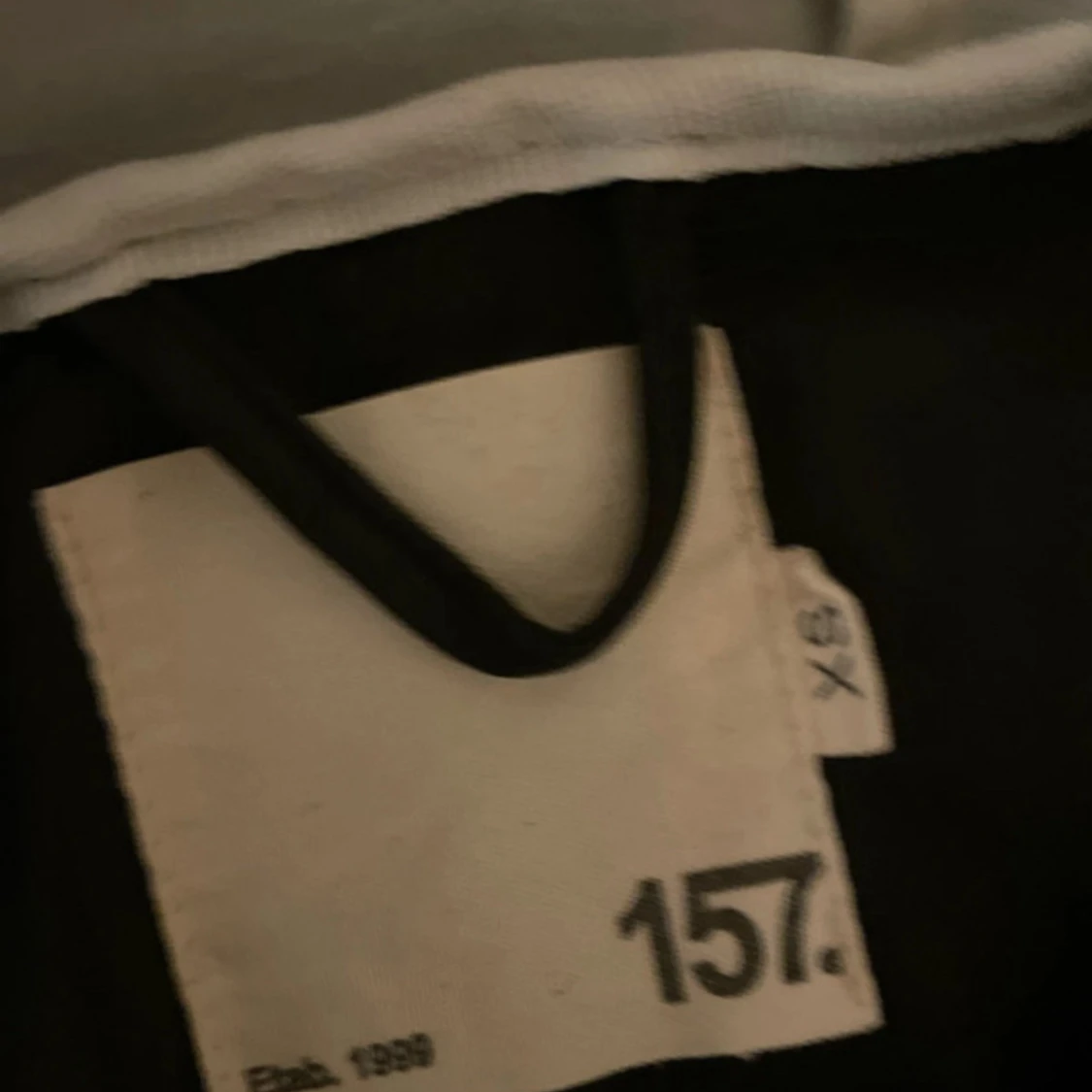 Svart regnjacka från 157 XS - 1