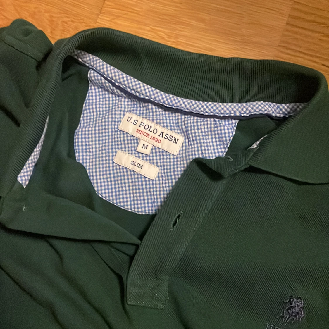 Mörkgrön pikétröja från U.S. Polo Assn. - 1