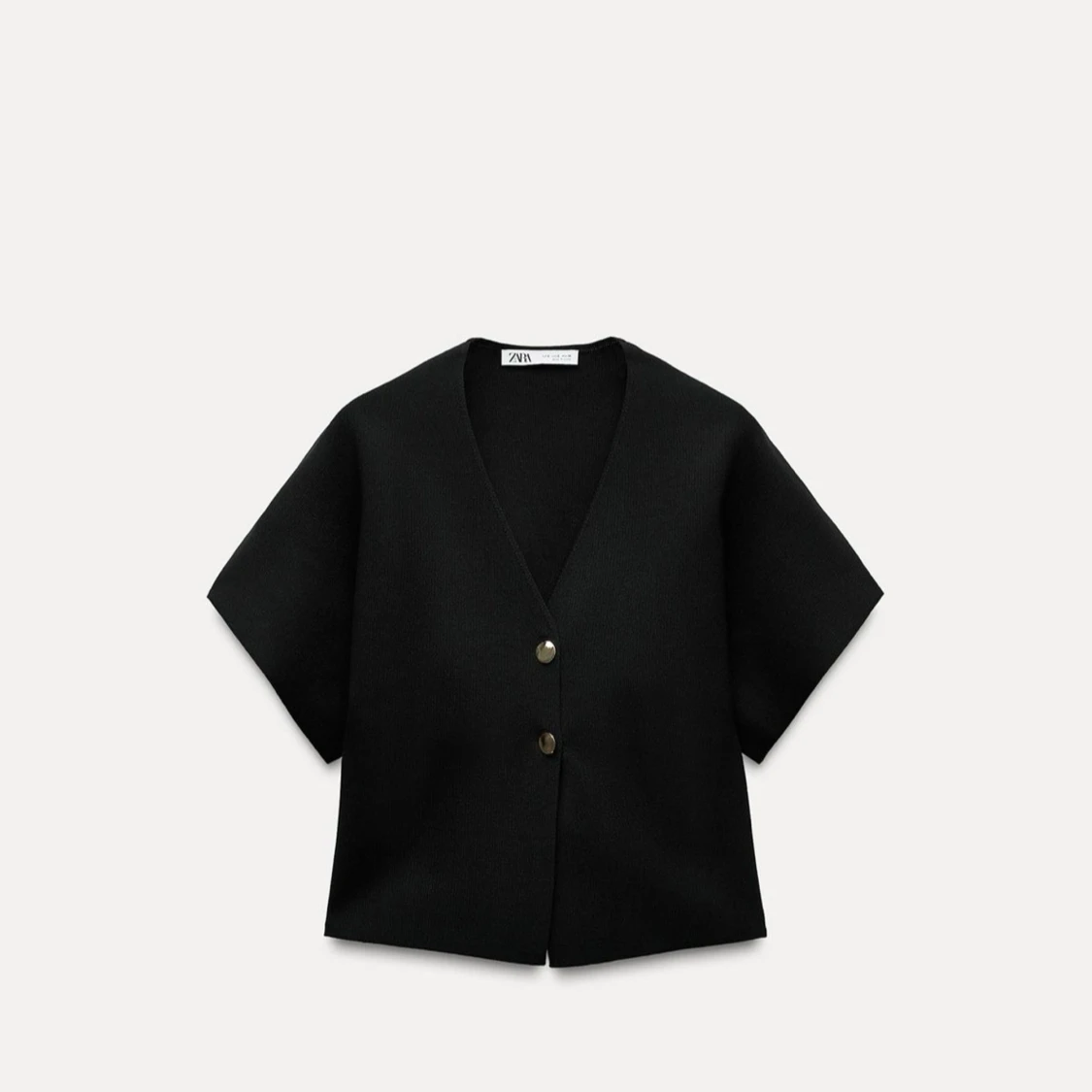 Svart väst med knappar från Zara