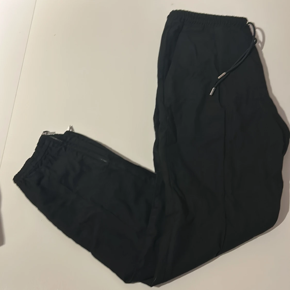 Dior the tailored black track