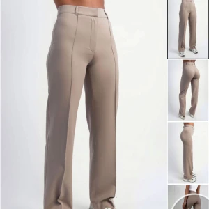 Beige kostymbyxor - Beige kostymbyxor med hög midja och rak passform