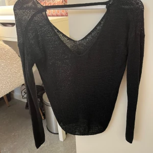 Rygglös tröja - Säljer då den inte kommer till användning.