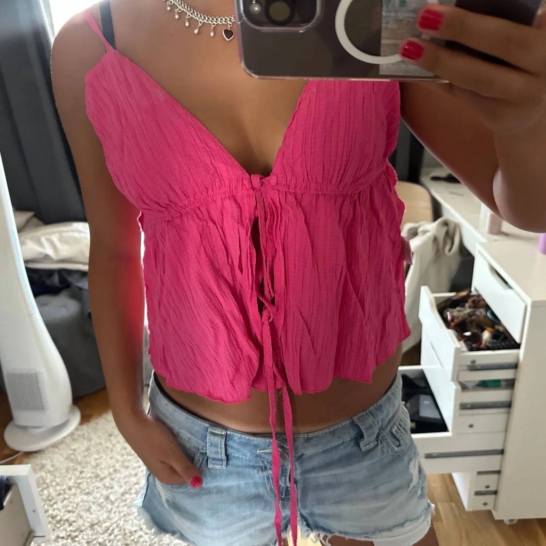 Rosa linnetopp med knyt framtill