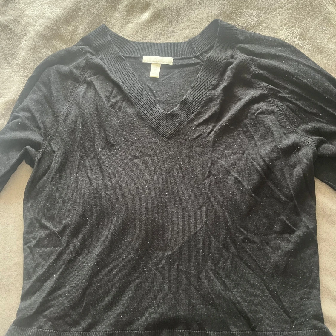 Svart v-ringad stickad tröja H&M XS