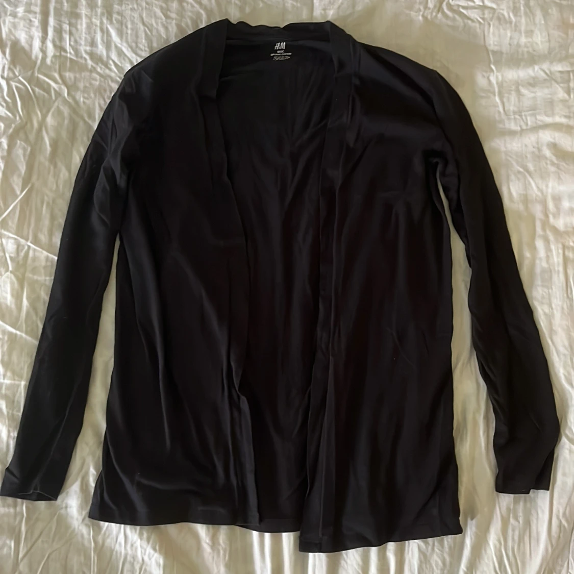 Svart tunn kofta från H&M Basic