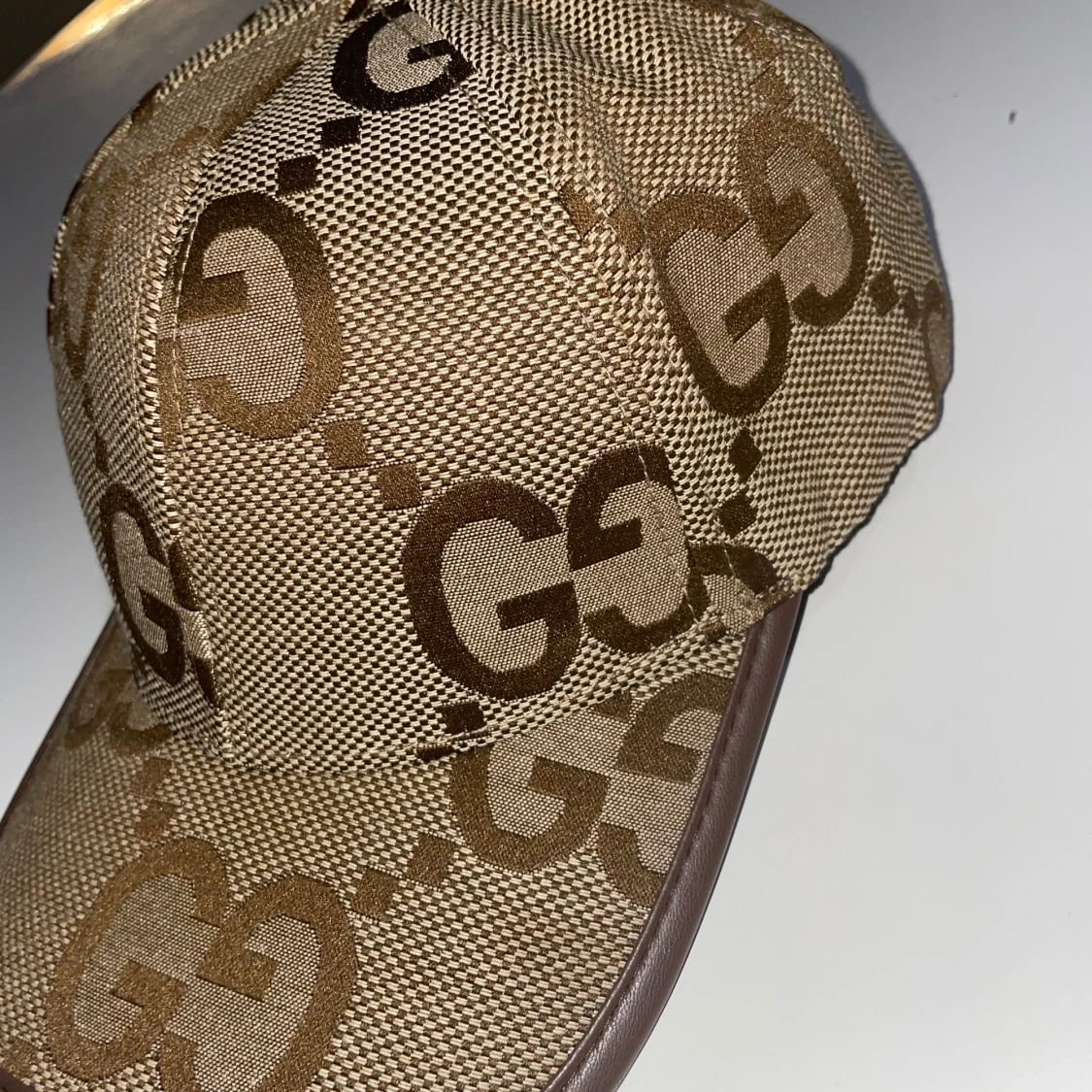 Beige keps med GG-mönster - 1