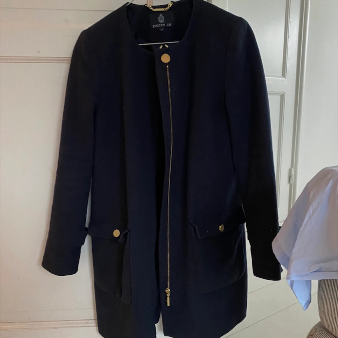 Marinblå kappa från Stockholm LM  - 90