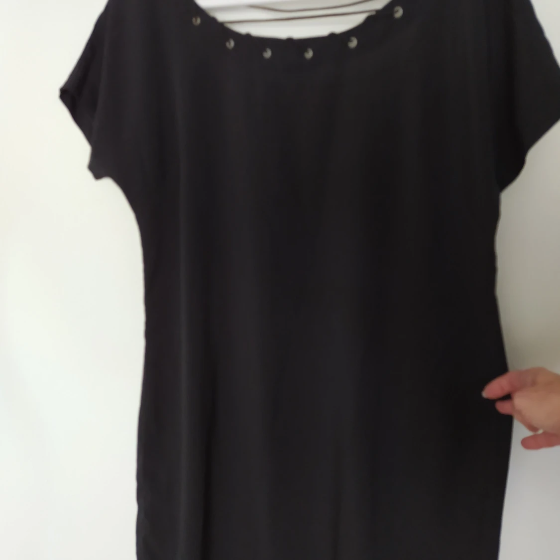 Svart kort klänning, snörning i ryggen