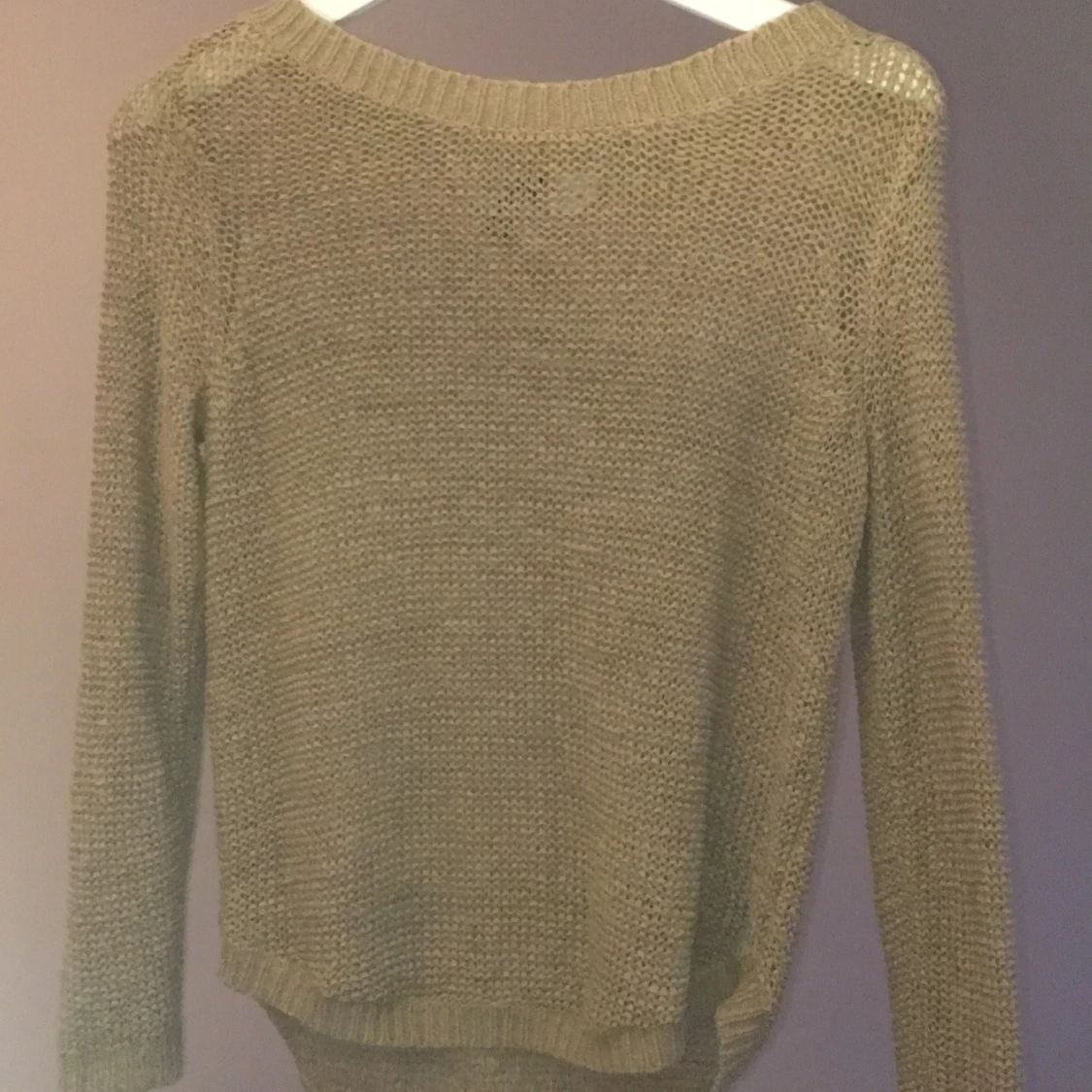 En stickad tröja typ från H&M