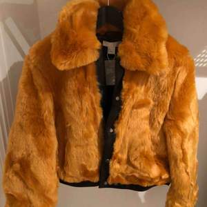 New genuine leather fur jacket with modern short lenght.Size XS -S
