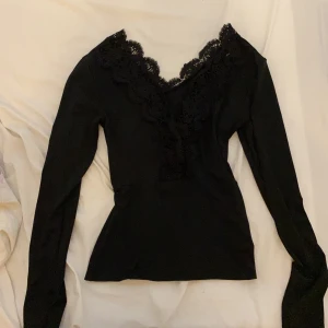 Långärmad tröja - Helt ny.