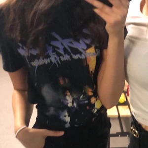 Oversized T-shirt  - En oversized T-shirt med ”purple rain” tryck från missguided. Använd fåtal gånger.