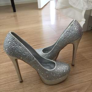 Was not worn.. Silver high heels.. 