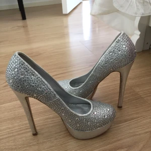  - Was not worn.. Silver high heels.. 