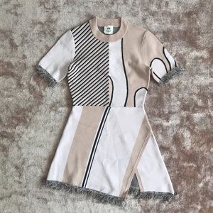  - Tight, kort klänning (jag är 176cm och den är lite för kort för mig) 