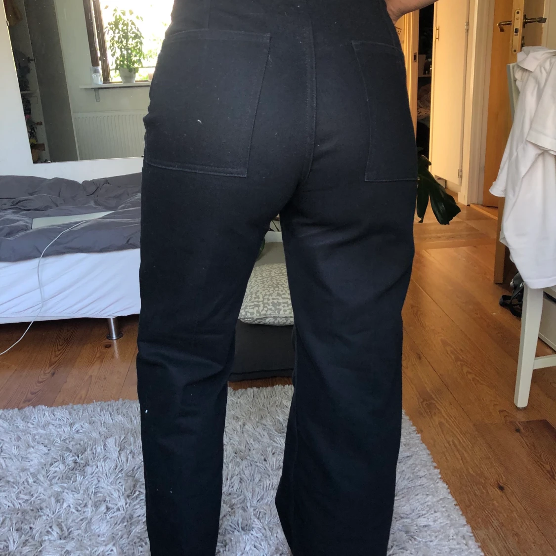 Långa svarta byxor - 91