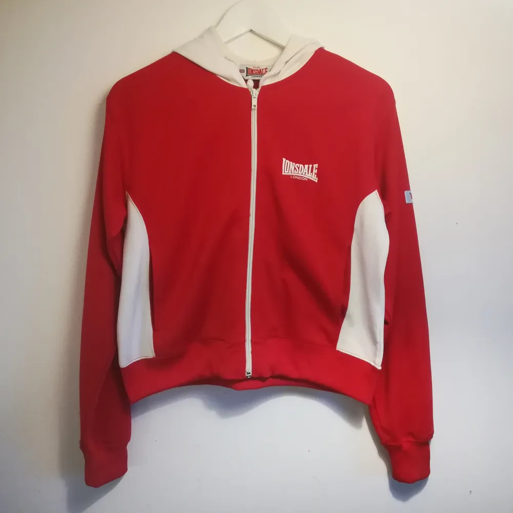 Beautiful retro Lonsdale London hoddie in a great condition. Originally size L, but would fit more as a M/S size. . Hoodies.