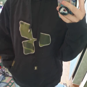  - black hoodie with camouflage print. The price can be discussed and shipping is not included.