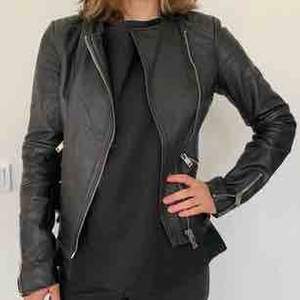 Real Leather Jacket with cool zipper details Brand: Zara Size: XS Colour: Black  Used but still in very good shape.