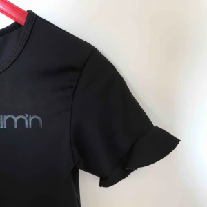  - En t-shirt i funktionsmaterial. Använd en gång, så mycket bra skick! 