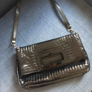  - FCUK foldable shoulder bag. Used but in good condition. Size of a magazine. Buyer pays for postage. 