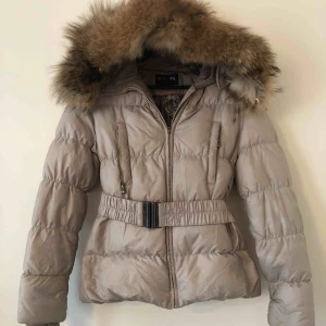  - Hollies winter puffer Jacket with a real fur good!  Size 38 and in excellent condition.