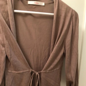  - Sweater, soft, elegant, works well with slim blue jeans and white tank top