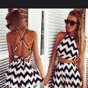  - Aldrig använt, en shortskjol i matchande magtröja 