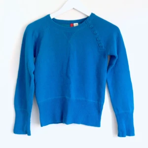  - Turkos stickad tröja från H&M