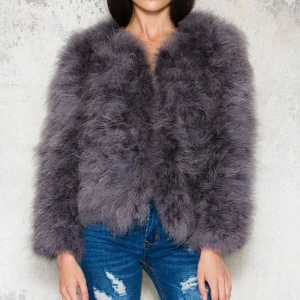  - Fjäderjacka från DM retro i färgen mörkgrå aldrig använd, säljer den för att jag aldrig får användning av den och slöseri att ha liggandes på hyllan.