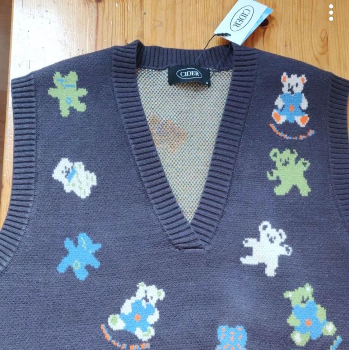 Sweatervest med nallar på - 90