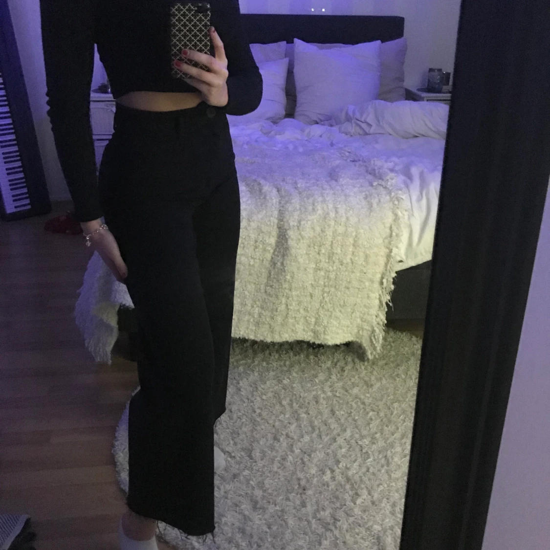 Svarta utsvängda jeans storlek 36