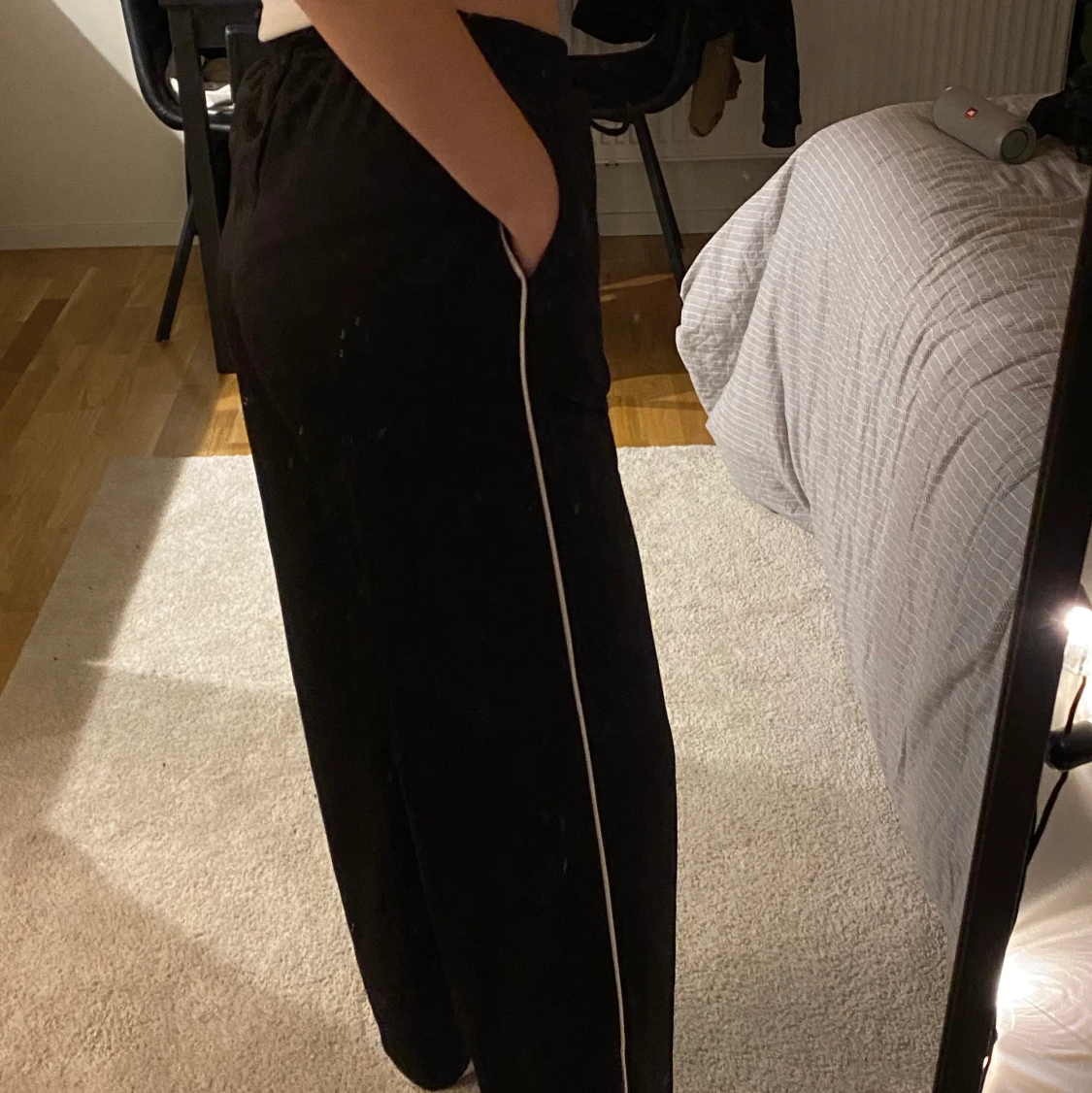 svarta tracksuitbyxor