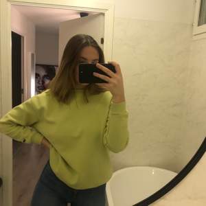 Grön/gul sweatshirt