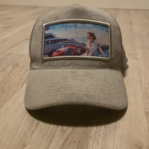 Revenite keps grå - Bra skick