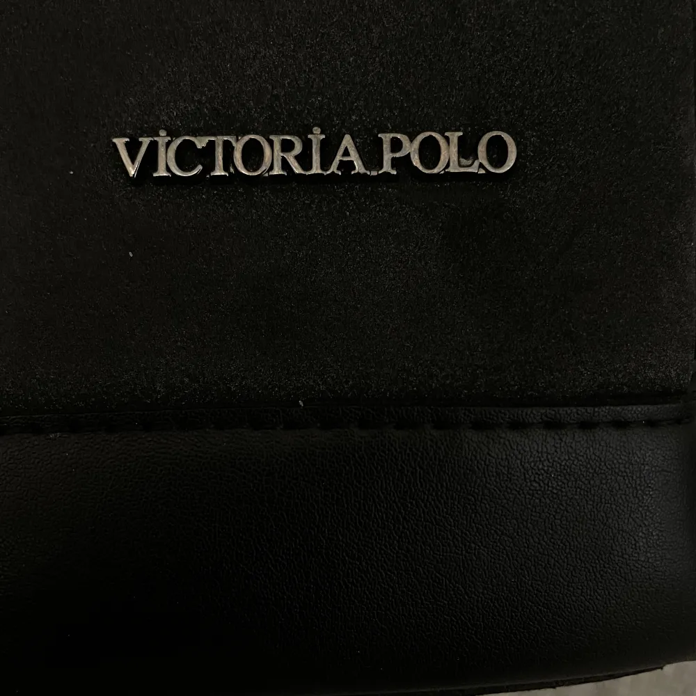 Victoria Polo väska med tre fack . Väskor.