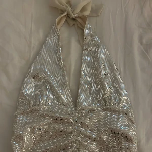 Glitter topp - Säljer denna snygga fest toppen ifrån ginatricot 