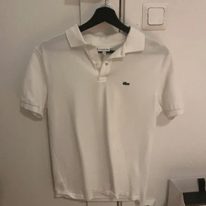 Lacoste piké Herr - Lacoste piké  Stl 176/ 16 år 